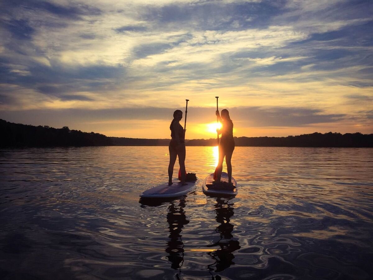Pohick Bay Stand Up Paddleboarders at sunset