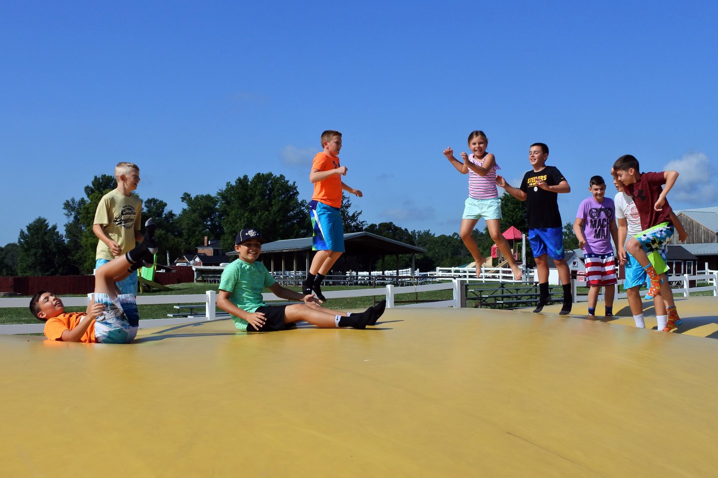 Kids jumping on jumping pillow