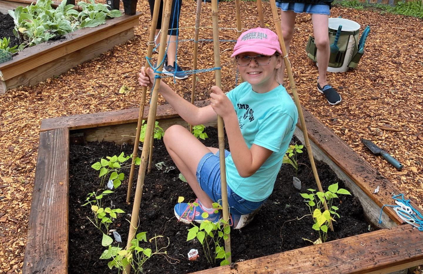 girl in garden Camp Grow and Scouts appreciation night