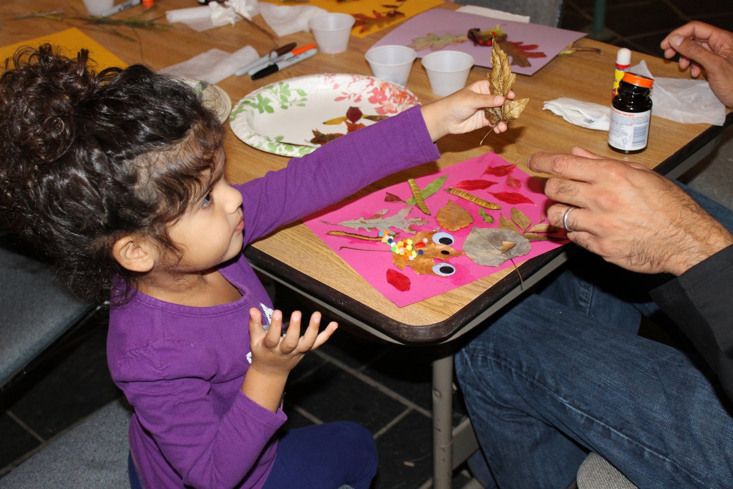 preschooler working on craft