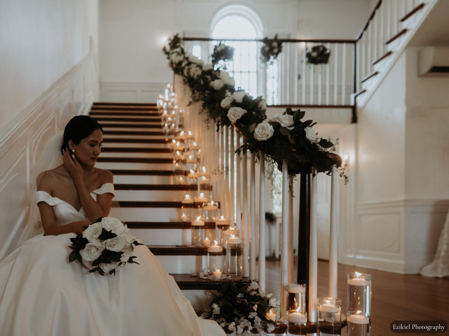 Bride on Rust Manor House, in Leesburg, Virginia staircase, staircase decorated with candles and flower