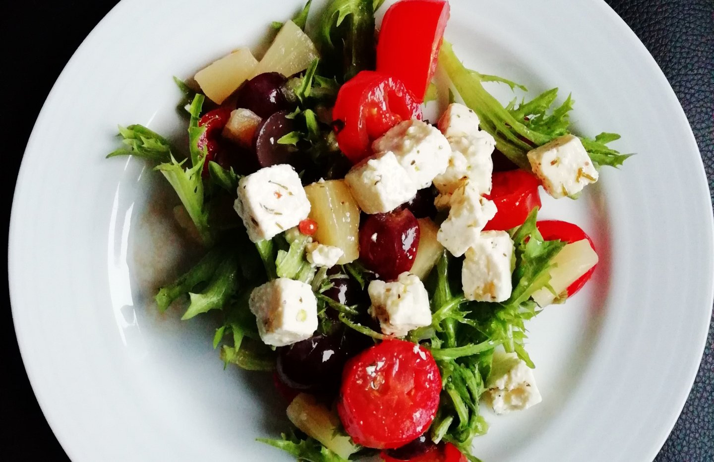 salad with grape tomatoes peppers and feta cheese