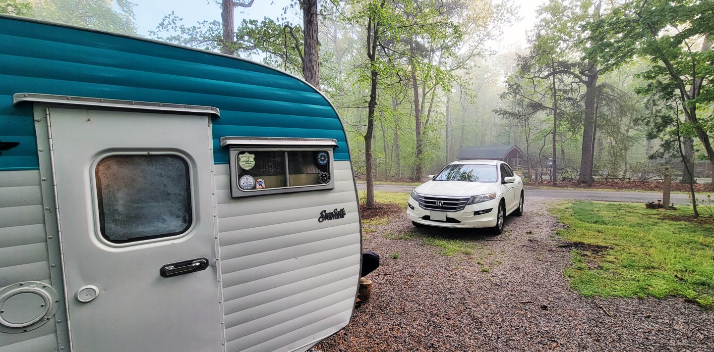 camper and white honda sedan parked at campground at Pohick Bay Regional Park