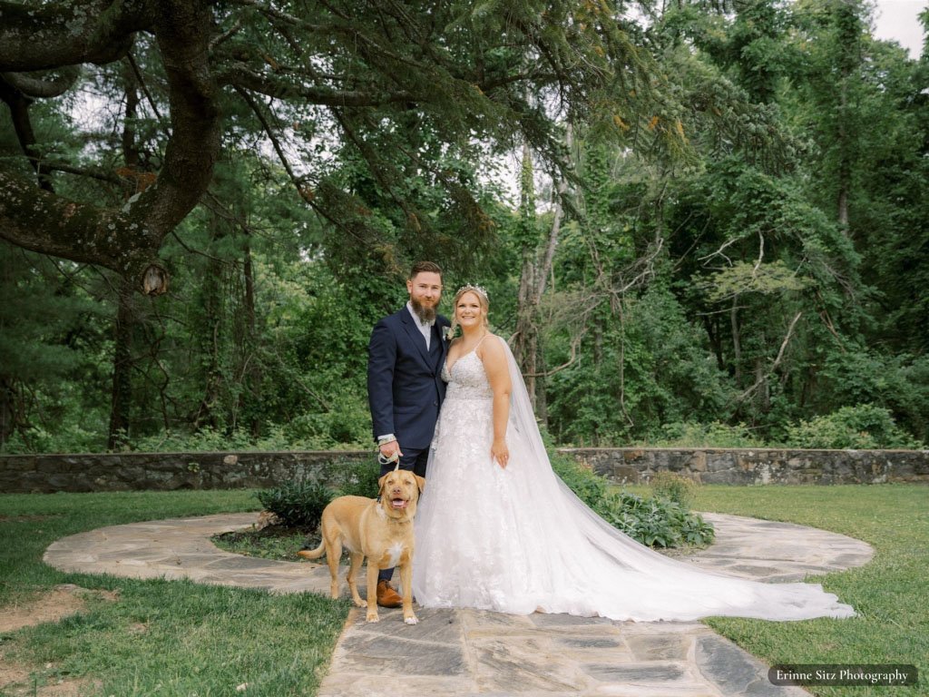 Bride and groom with their dog