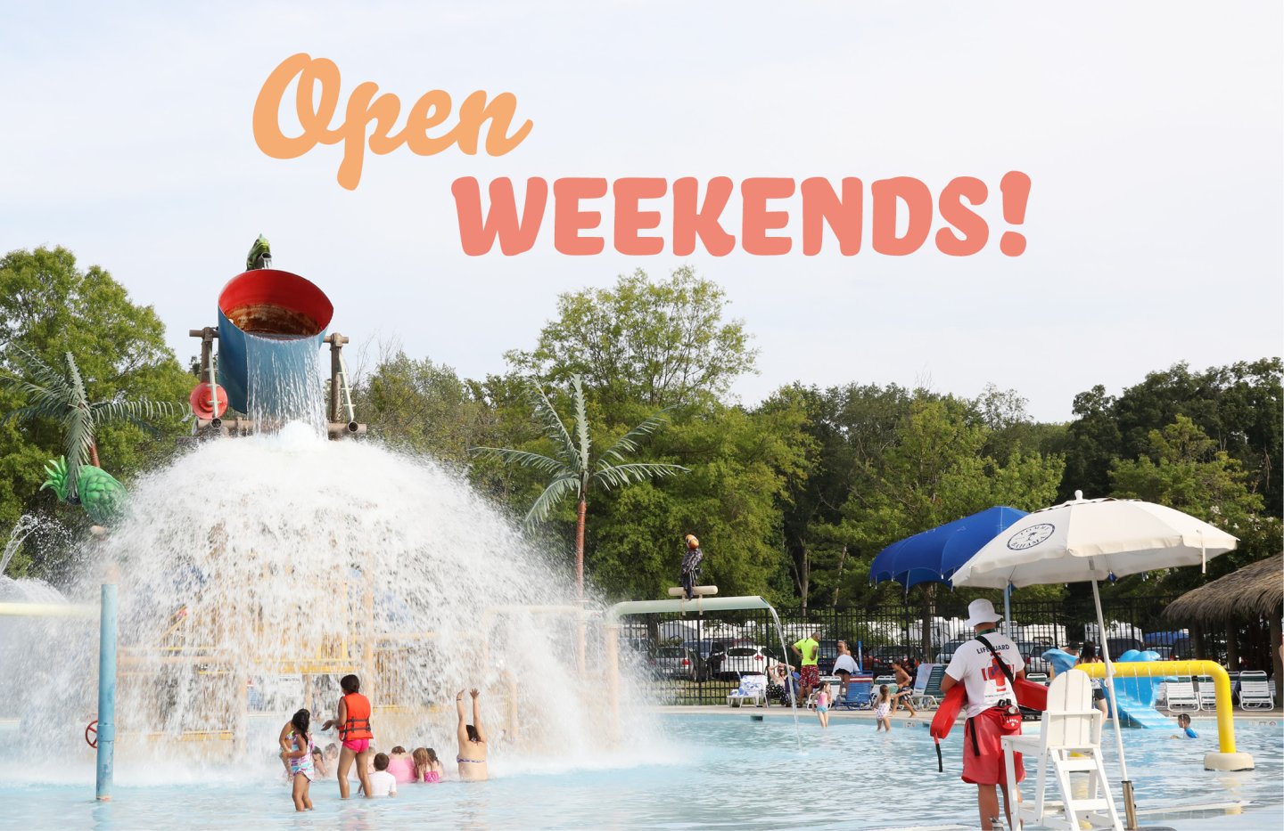 waterpark dumping bucket with kids under the water overlay text reads Open Weekends!