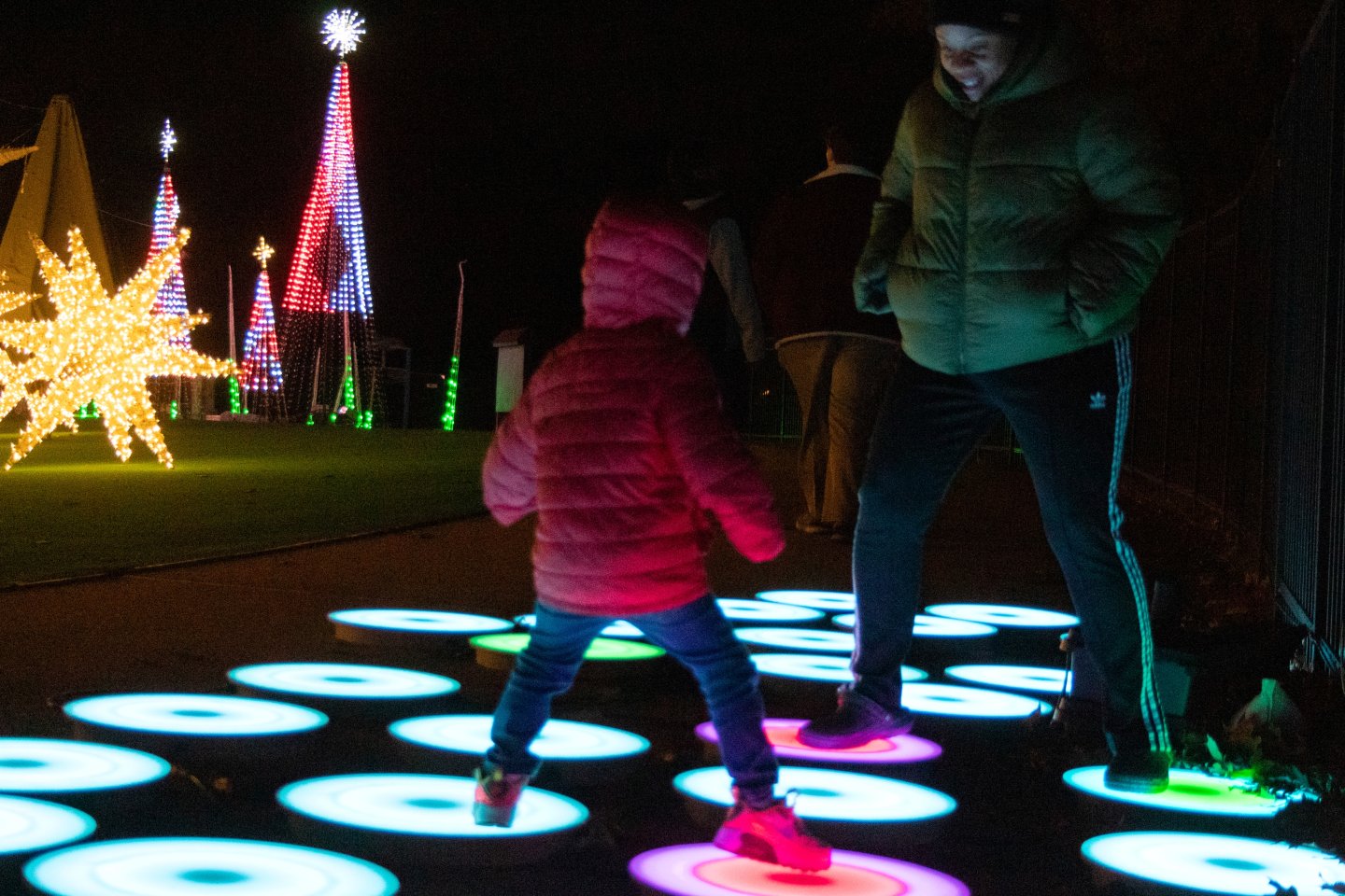 Young boy and mom at Ice and Lights