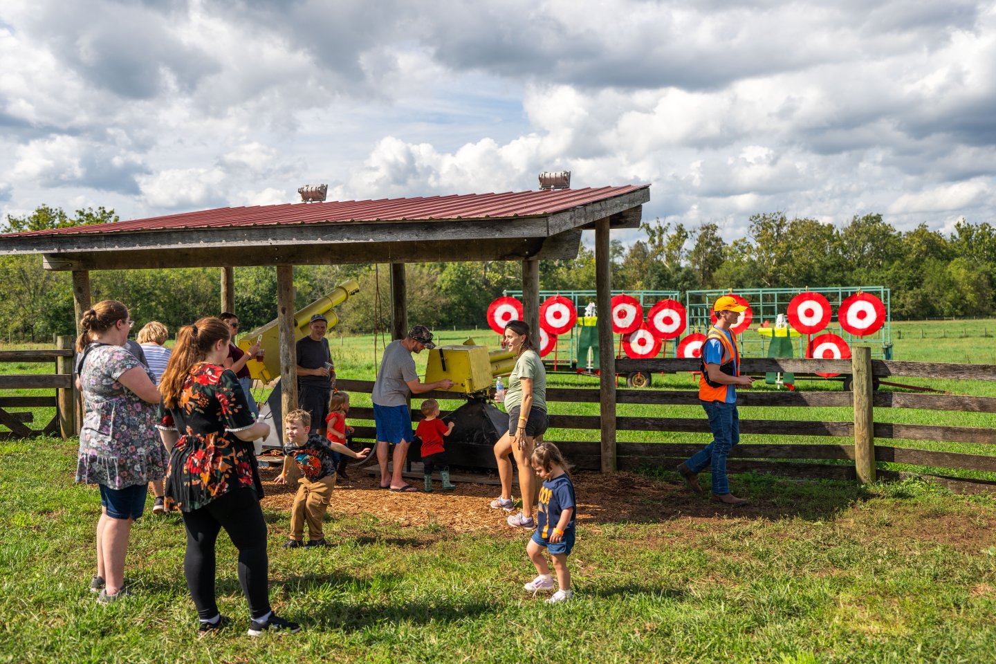People launching pumpkin cannons