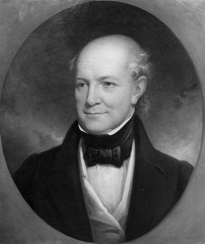 Bust of a man in a suit and bowtie, 19th-century style, oval frame, grayscale.