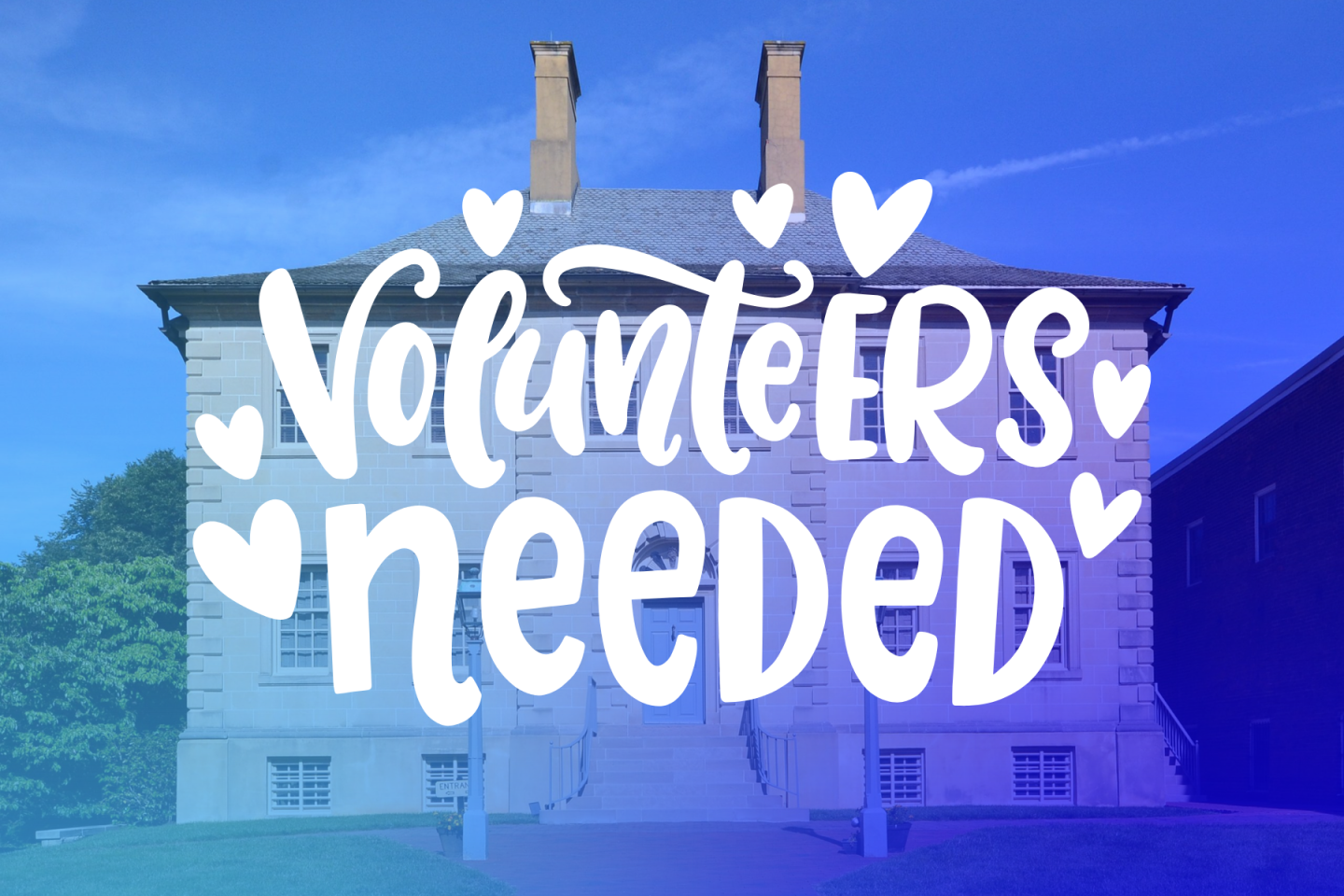 Historic building with "Volunteers needed" text overlay.