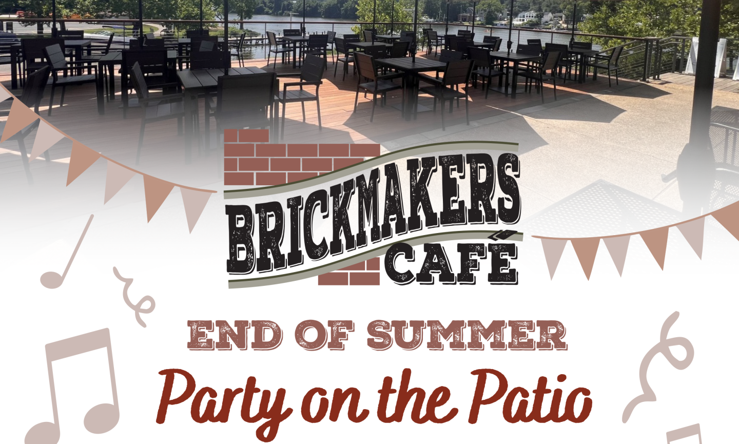 Brickmakers Cafe logo over patio with trees and tables.