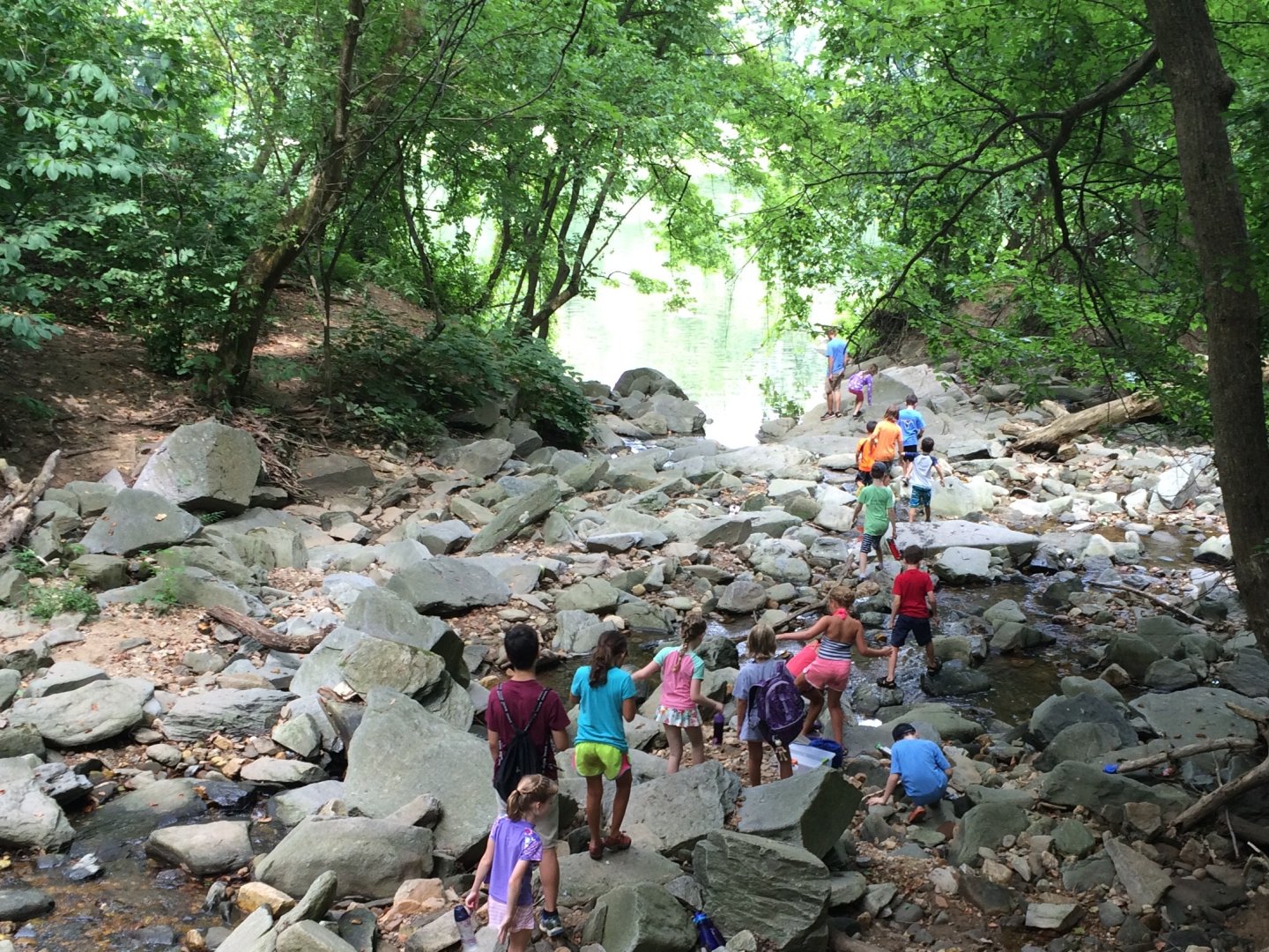 kids hiking on rocks